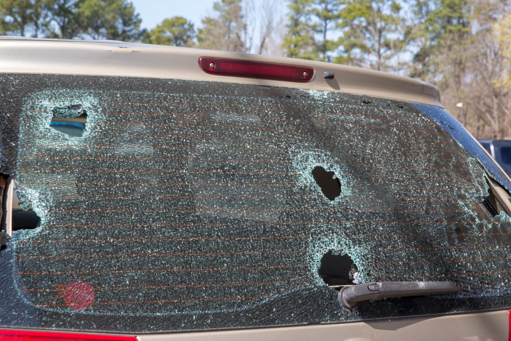 PIC SS CAR REAR WINDOW HAIL DAMAGE